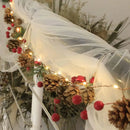Cordão de Luz com Pinhas – Iluminação Decorativa Natalina